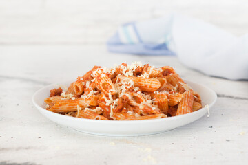 Penne with tomato and cheese