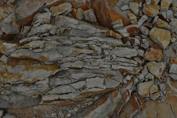 The rusty reddish rock stones along with the Makomanai river in Sapporo Japan