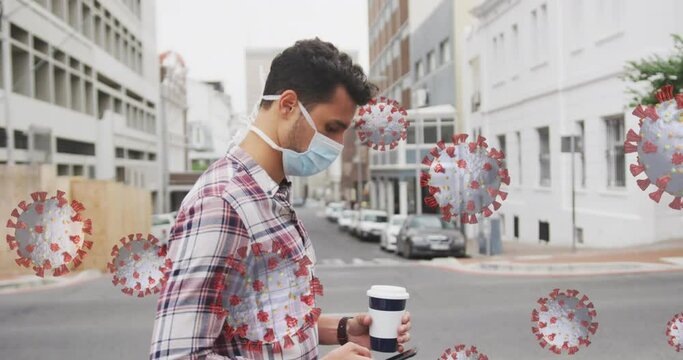 Animation of virus cells over caucasian man wearing face mask