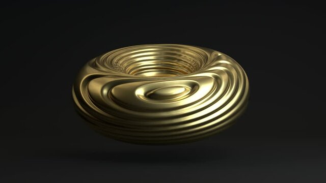 3d loop animation of an abstract geometric figure with curves and waves on the surface. The torus of gold constantly changes the shape of the convolutions.