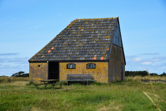 Texel, the Netherlands, August 2021. Autenthic barn for sheep on the isle of Texel.