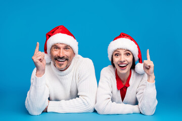 Obraz premium Portrait of beautiful handsome friends friendship trendy couple showing v-sign eve day isolated over bright blue color background