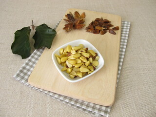 Shelled and cooked beechnuts in a small bowl