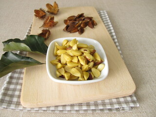 Shelled and cooked beechnuts in a small bowl