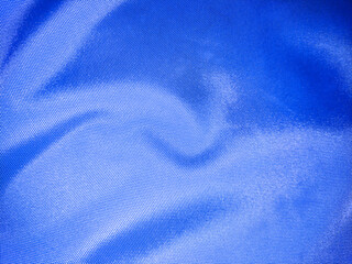 Close up of polyester textured blue synthetical background