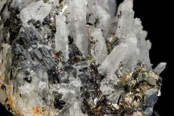 Macro mineral stone Galena, Sphalerite, Pyrite, Quartz on a black background