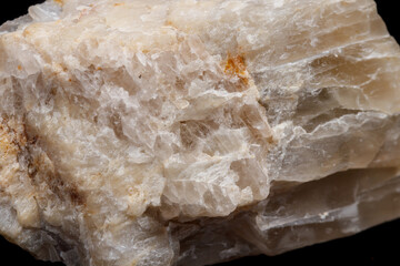Macro mineral stone Moonstone a black background