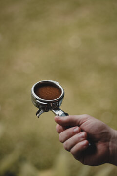 Freshly ground and tamped coffee ready to pull an espresso shot