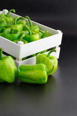 bell pepper, green pepper, pepper on black background