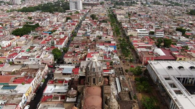 Populated Urban City Of Guadalajara Mexico And The Virgen de Guadalupe Cathedral - aerial view