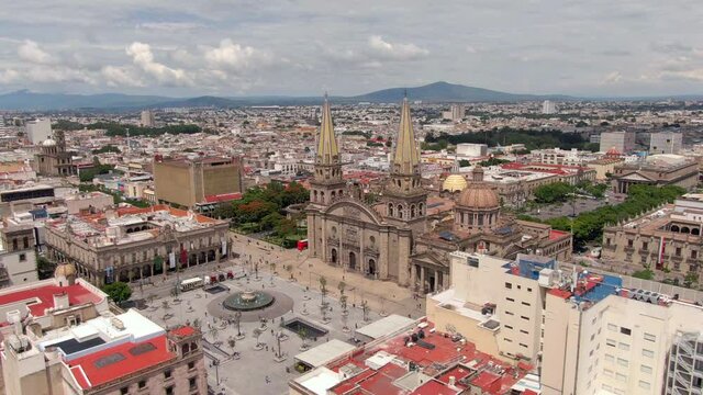 Aerial View Of Guadalajara Cathedral And Plaza Guadalajara In Jalisco, Mexico. - orbit left