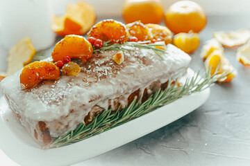 Christmas oranges cake  . Homemade citrus cake, christmas homemade baking background. Stollen homemade Christmas cupcake