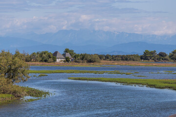View of Casoni - Grado (GO). Rural building with a sloping roof covered with straw, once widespread in the countryside in the lagoon area of Grado