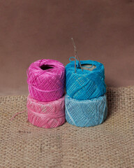 Embroidery thread made especially for embroidery. Yarn with a fine and soft texture. Embroidery threads of various colors. Yarn mockup. Focus blur.