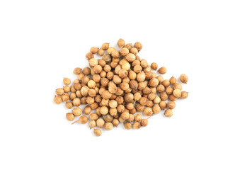 Heap of dried coriander seeds on white background, top view