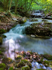Obraz premium beautiful waterfall in the mountain forest