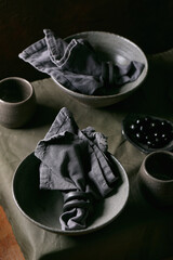 Rustic table setting with craft ceramic tableware