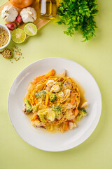 Ifumi is an Indonesian crispy deep fried thick noodle dish, popular in Maritime Southeast Asia, served in a thick savoury sauce with pieces of meat or seafood and vegetables.