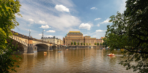 National Theatre building and Legion Bridge, Prague, Czech republic, waterfront view across the...