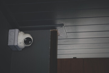 Security CCTV camera on the exterior of a building.