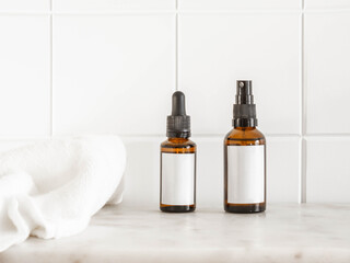 Mockup for care cosmetics products - two amber bottles with white labels
