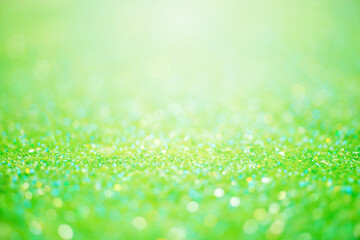 Glitter light abstract green bokeh light background