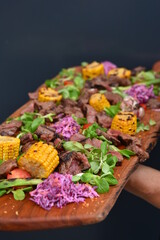 Roastbeef with corn and red cabbage