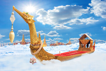 The Royal Barge Suphannahong with grand palace flying on paradise the clouds bangkok, thailand