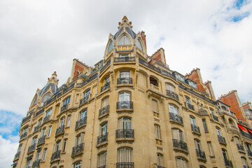 Fototapeta na wymiar Paris, France. Art Nouveau And Haussmannian Architecture Of A Residential Building In Rue Cardinet, Paris, France. low angle