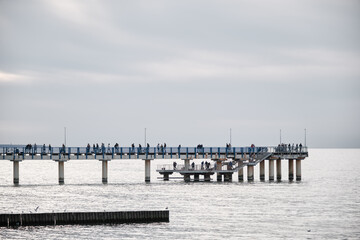 Fototapeta na wymiar pier with people