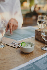 couple eat greek food in greek restaurant