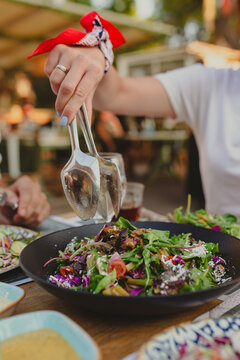 couple eat greek food in greek restaurant
