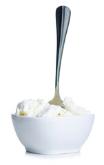 Cottage cheese in bowl with spoon on white background isolation