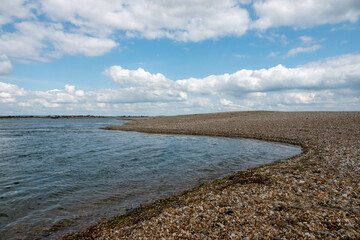 beautiful deserted English beach in West Sussex on a bright summer day