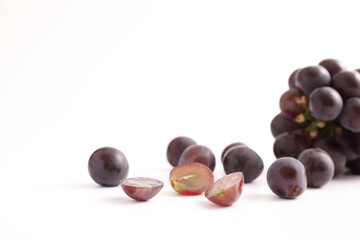Red grapes isolated in white background
