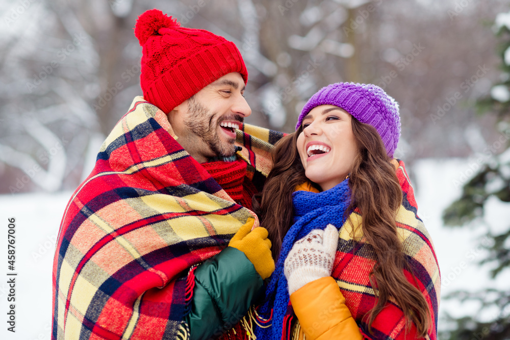 Canvas Prints photo of adorable funny girlfriend boyfriend dressed vests covering plaid duvet laughing embracing w