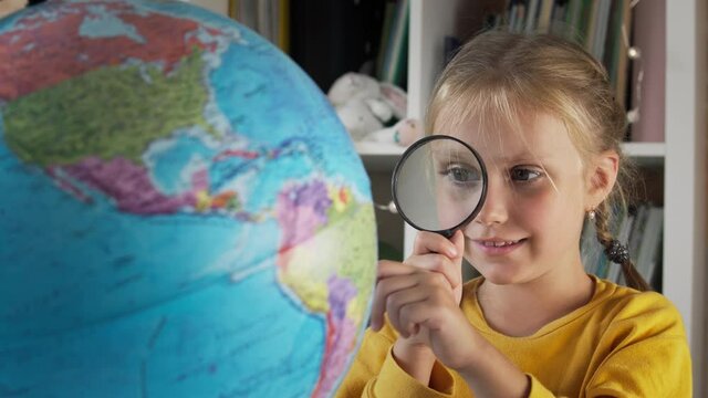 World map and schoolgirl