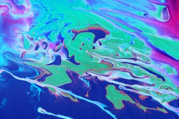 Abstract green-crimson-lilac marble background. The lines and waves of acrylic paint create an interesting structure. Background for web design, fabric, design, laptop case.