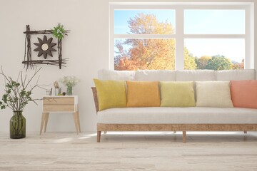 Autumn interior in white color with sofa and yellow landscape in window. Scandinavian interior design. 3D illustration