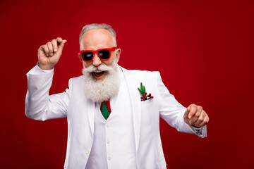 Photo of funky elder grey hair man dance wear eyewear white jacket isolated on red color background