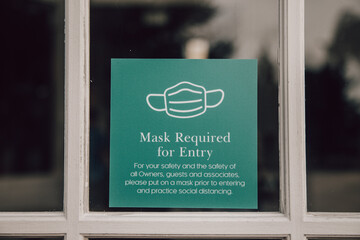 mask required for entry door sign Stock photo Royalty free