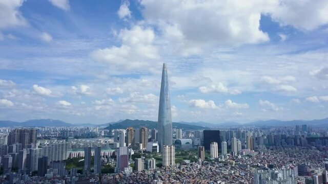 Aerial view of Jamsil area in Seoul, South Korea capital city, Cityscape of Seoul skyscraper. July, 2021. 서울 잠실 초고층빌딩. 롯데월드타워