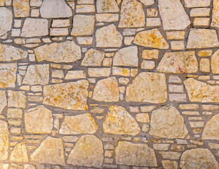 rough stone wall closeup, seamless natural background