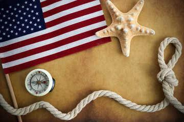 Happy Columbus Day concept. Compass with American flag on vintage background