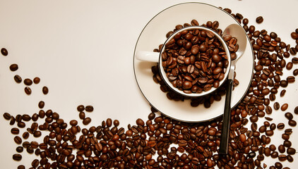Coffee background with beans and white cup. making coffee in pub, bar, restaurant. Top view.
