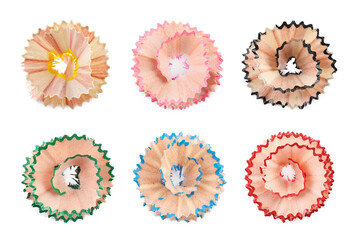 Set with different pencil shavings on white background, top view