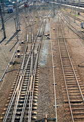 Fototapeta premium Railway rails at the station. Vertical photo