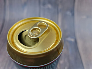The Opened can of beer. Beer can in the close-up.