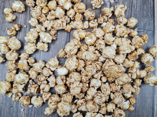 The Fresh hot natural popcorn close-up. Fresh caramel corn.