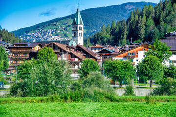 Beautiful town of italian alps in summer season.